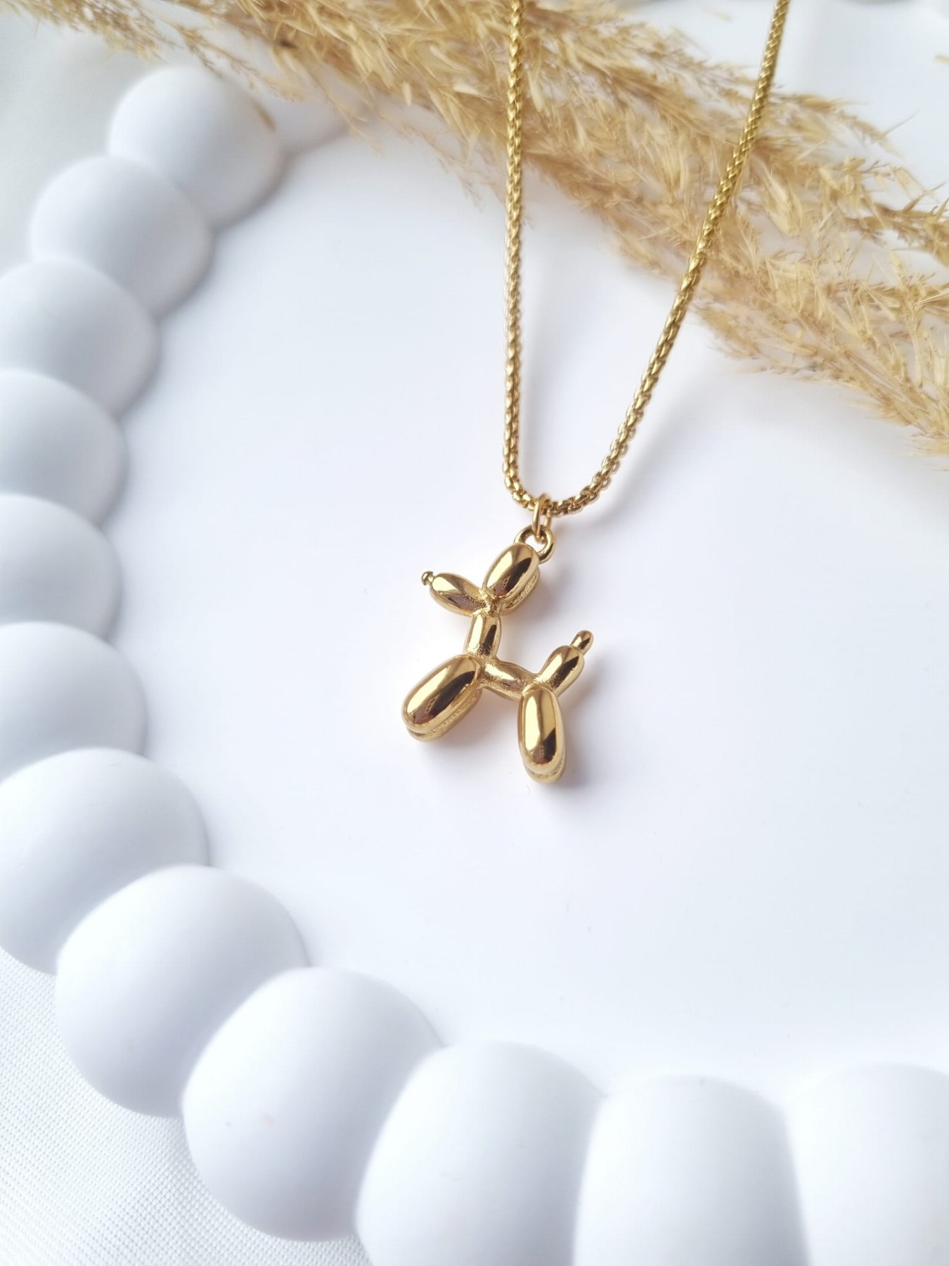 naszyjnik piesek zawieszka